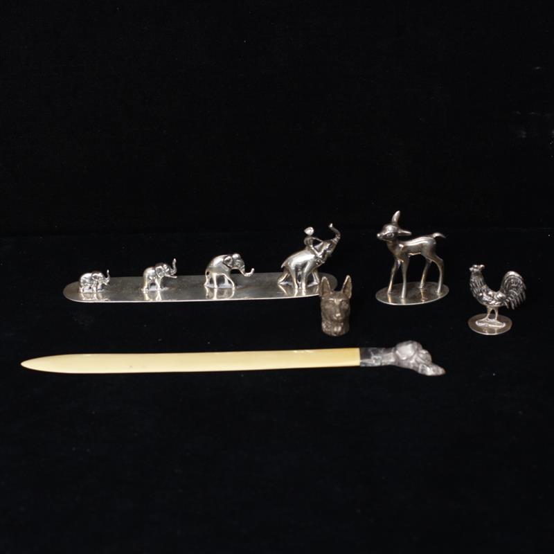 Appraisal: German silver animal figurine and figure group miniatures and ivory