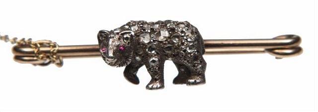 Appraisal: A LATE VICTORIAN BAR BROOCH with a diamond set grizzly