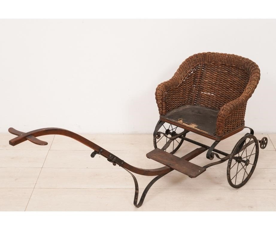 Appraisal: Child's wicker sulky with leather seat circa h x w