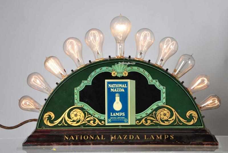 Appraisal: Painted Tin -Bulb Mazda Lamp Display Description Working Individual switches