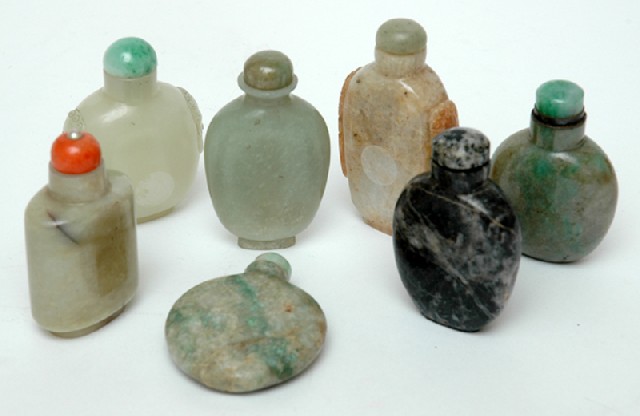 Appraisal: SEVEN CHINESE JADE SNUFF BOTTLES Qing Dynasty and Later Of