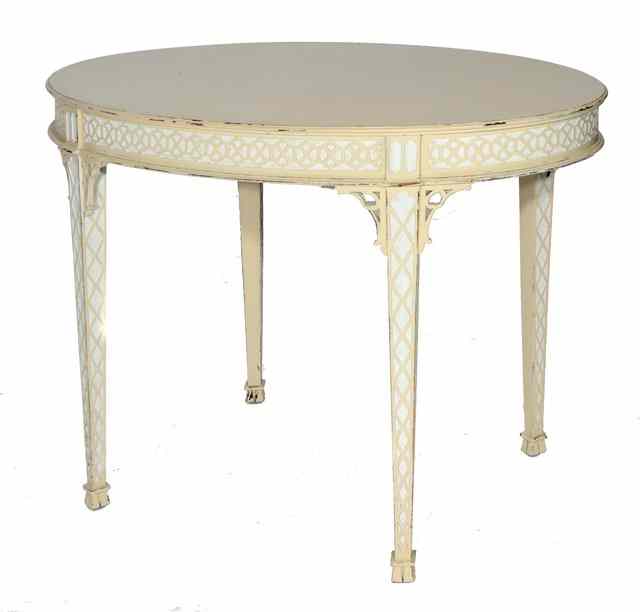 Appraisal: A CHINESE CHIPPENDALE STYLE OVAL CENTRE TABLE with blind fretwork