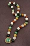 Appraisal: NECKLACE - Graduated strand of mm various color jade beads