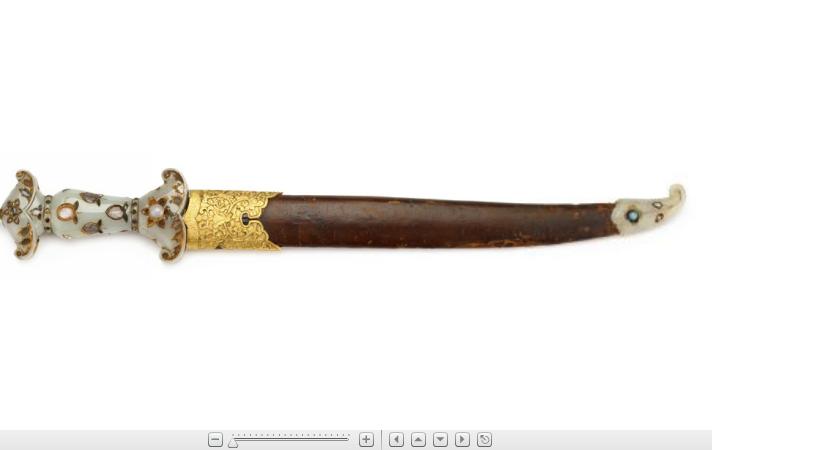 Appraisal: Fine Mughal white jade and gilt bronze mounted dagger th