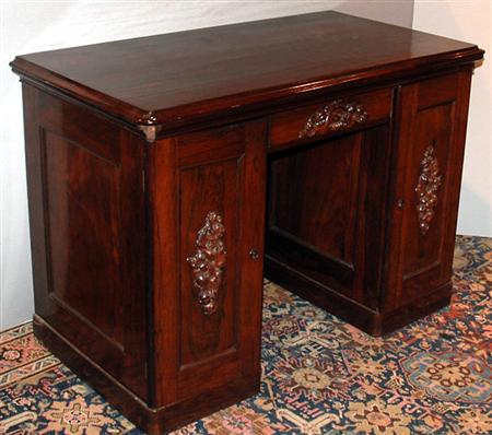 Appraisal: American Rococo Revival Rosewood Diminutive Pedestal Desk Estimate -