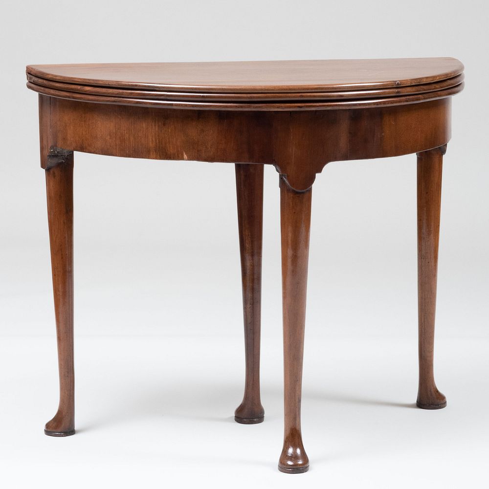 Appraisal: George II Walnut Triple-Top Tea Games Table The back leg