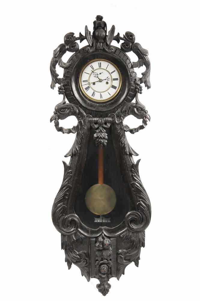 Appraisal: REGULATOR - th c Black Forest carved case wall regulator