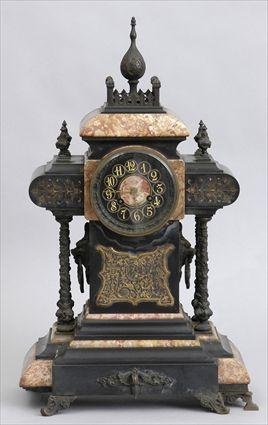 Appraisal: BAROQUE-STYLE BRONZE-MOUNTED MARBLE MANTEL CLOCK The in dial within a