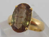 Appraisal: A brown tourmaline dress ring the large oval stone x