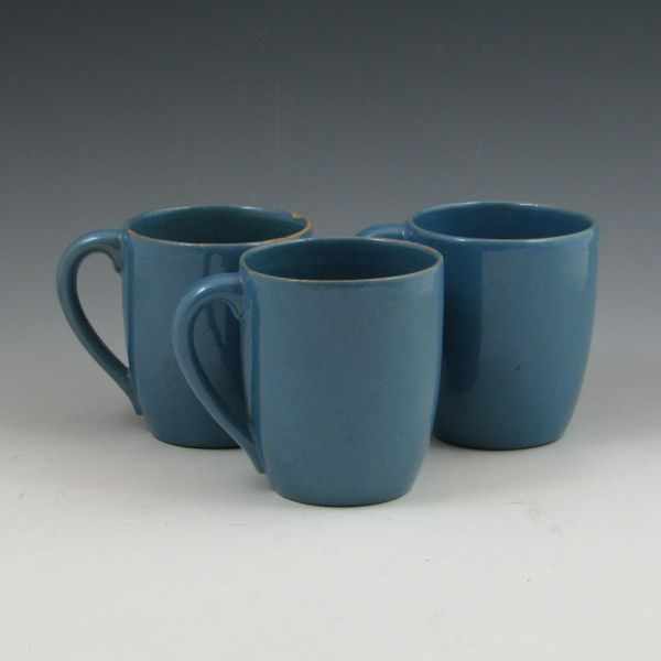 Appraisal: Three light blue Paul Revere Pottery cups All are marked