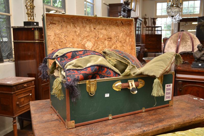 Appraisal: A TRAVEL TRUNK CONTAINING WOVEN PILLOW COVERS