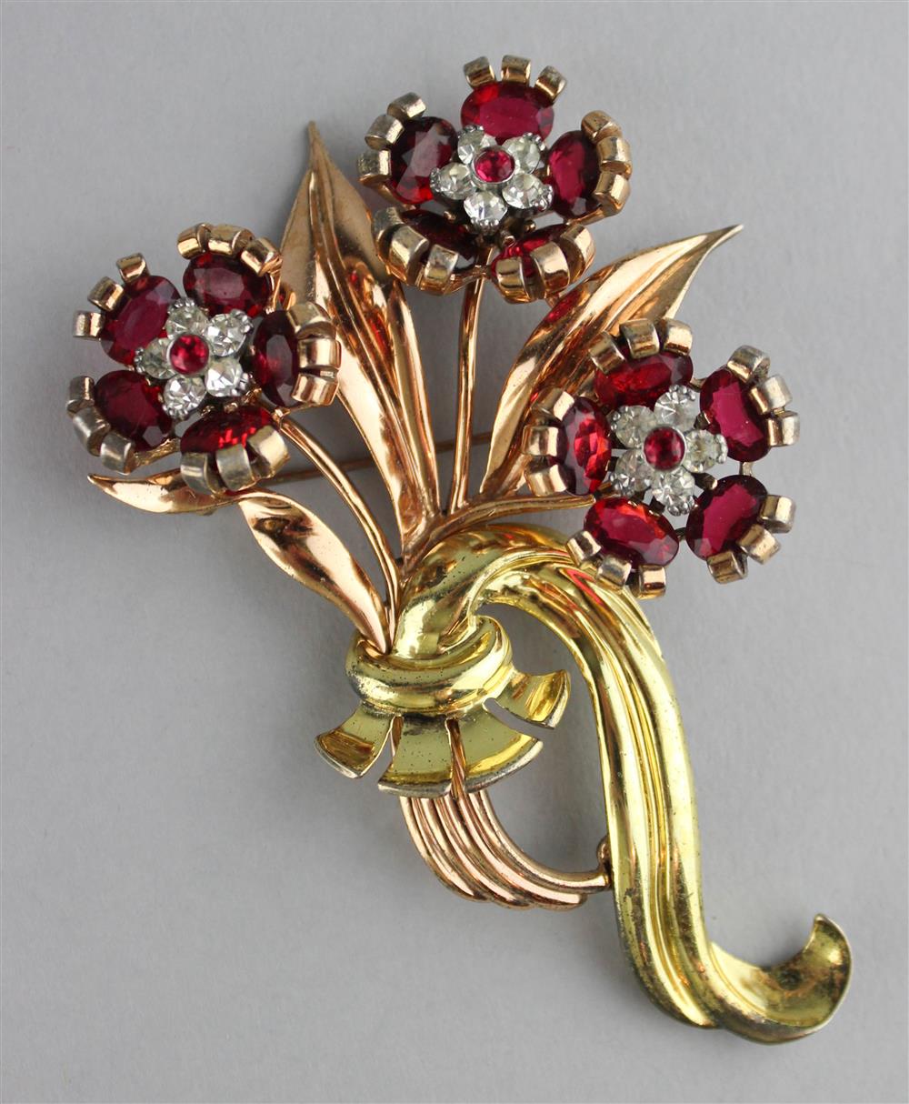 Appraisal: PENNINO STERLING FLOWER PIN WITH RED AND COLORLESS RHINESTONES signed