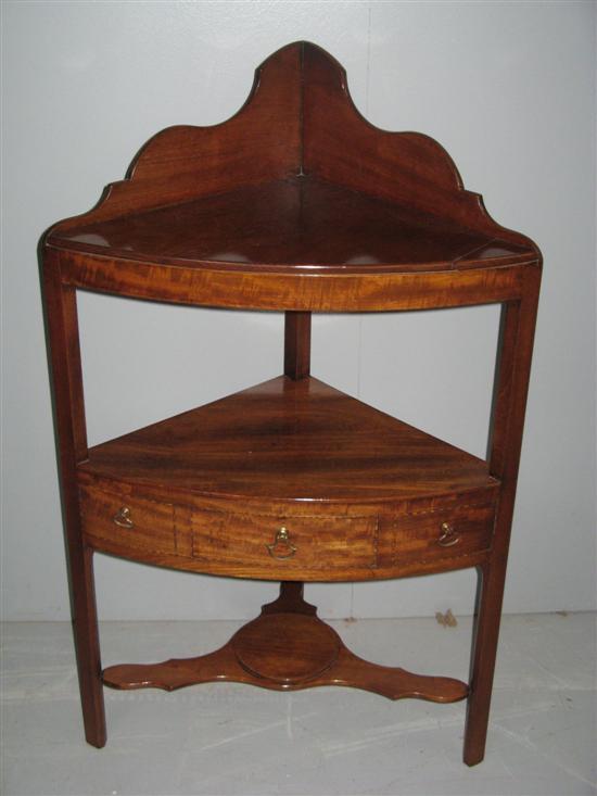 Appraisal: th century mahogany three tier corner washstand with one drawer