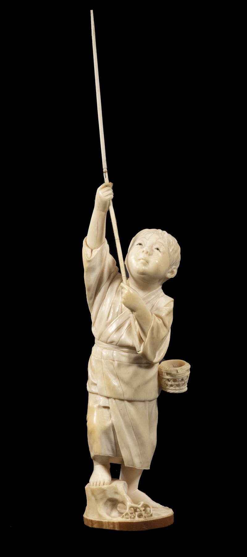 Appraisal: TH C JAPANESE IVORY OKIMONO Figure of a Young Boy