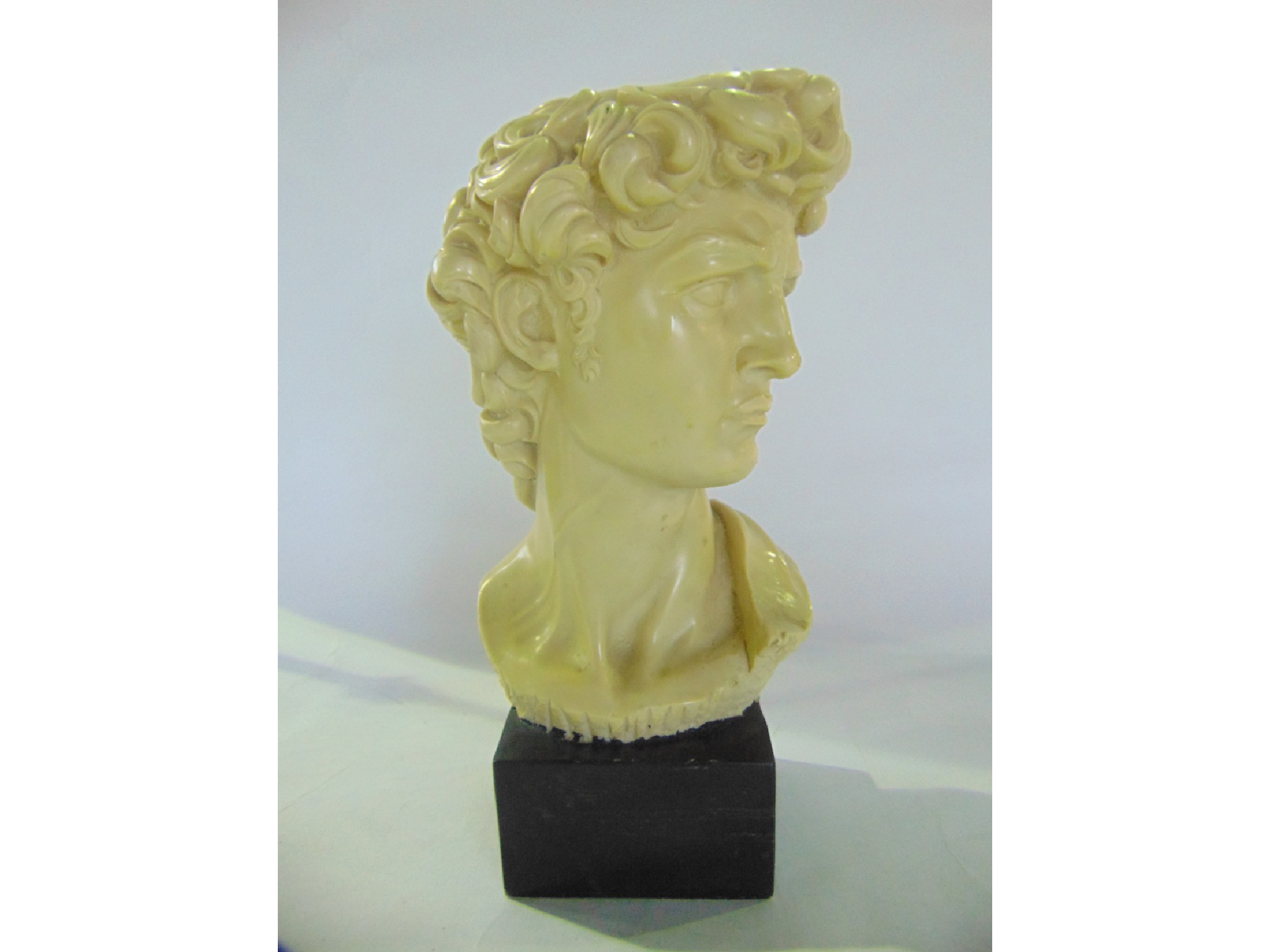 Appraisal: A heavy composite to simulate white marble classical bust length