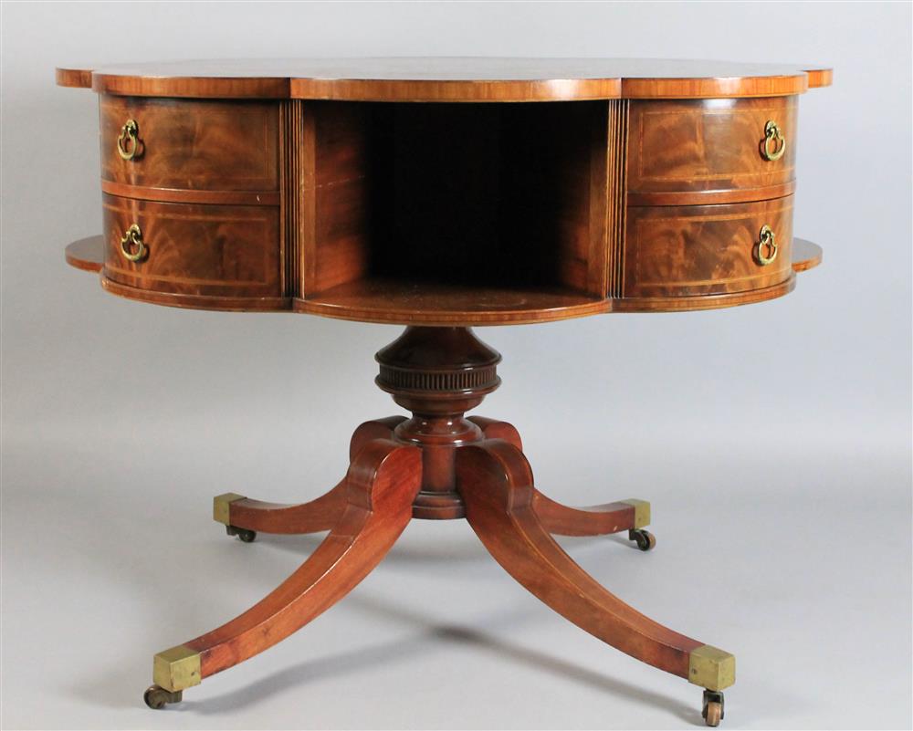 Appraisal: ENGLISH STYLE MAHOGANY CLOVER LEAF LIBRARY TABLE WITH TOOLED LEATHER