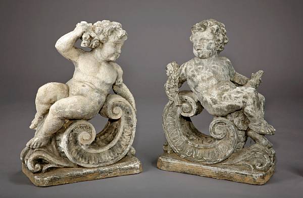 Appraisal: A pair of Baroque style cast stone figures of putti