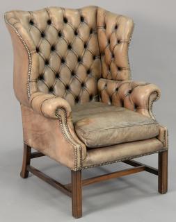 Appraisal: Chippendale style wing chair with tufted leather upholstery faded Chippendale