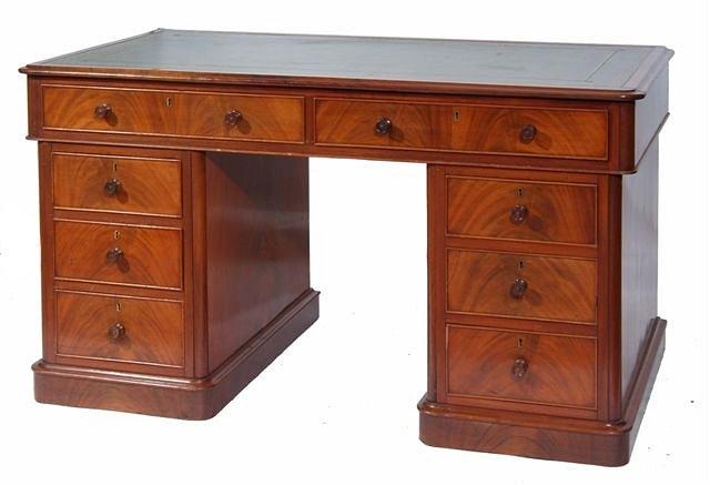 Appraisal: A VICTORIAN MAHOGANY RECTANGULAR PEDESTAL DESK having a gold tooled