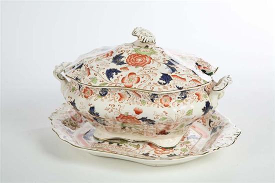 Appraisal: IRONSTONE COVERED TUREEN AND PLATTER Decorated with salmon colored flowers