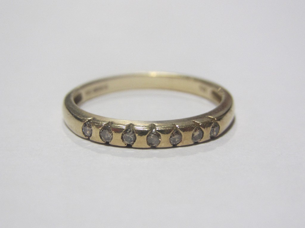 Appraisal: Nine carat gold champagne diamond half hoop ring