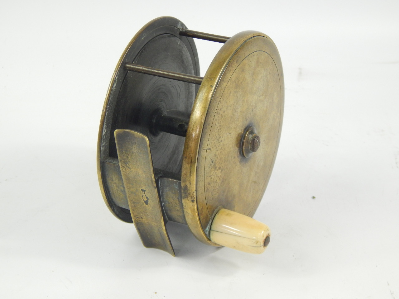 Appraisal: A Victorian brass fishing reel by C Farlow Co Strand