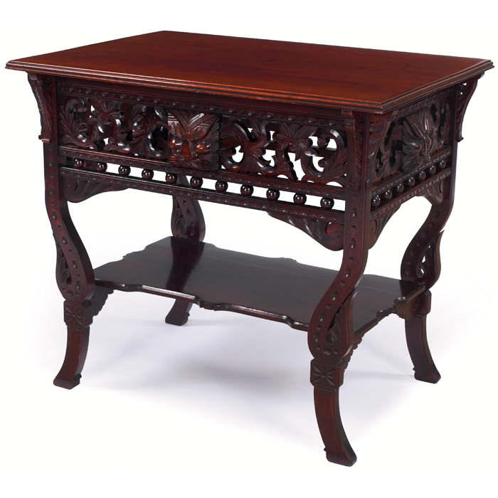 Appraisal: Arts and Crafts period library table mahogany finish carved figural