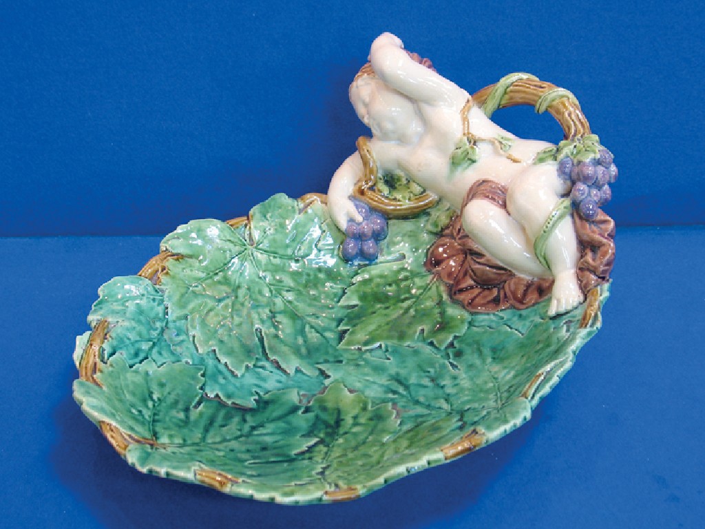 Appraisal: A MINTON'S MAJOLICA FRUIT DISH of leaf design with a