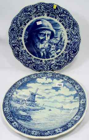 Appraisal: Royal Sphinx Delft Blue and White Charger of a Windmill