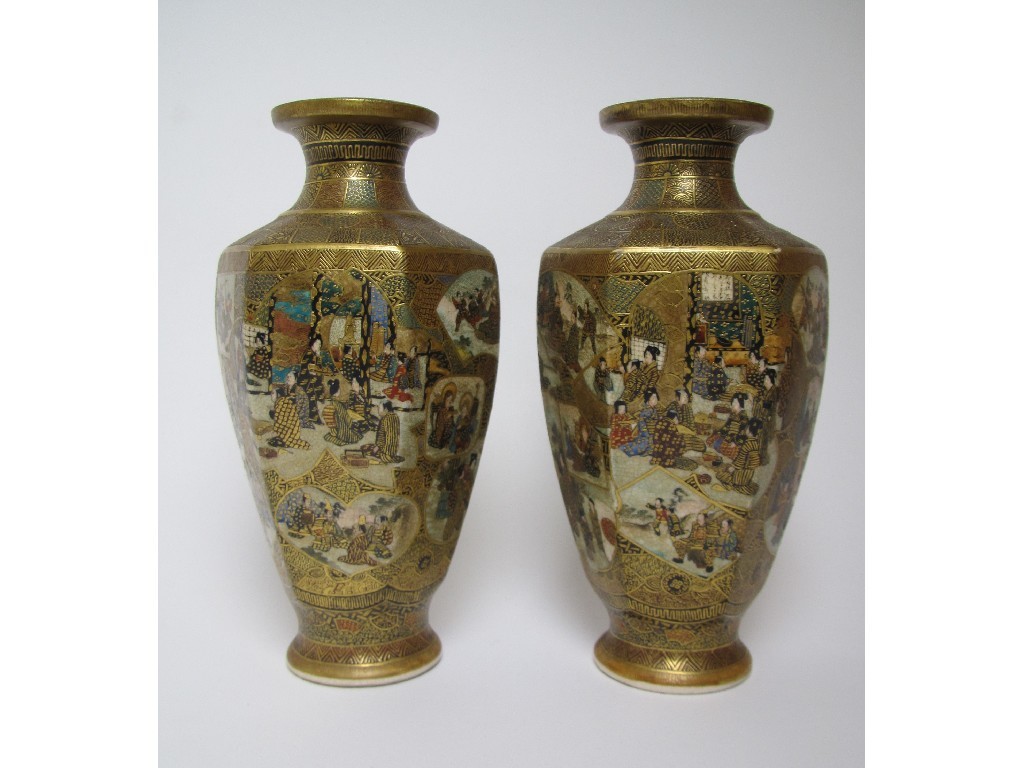 Appraisal: A pair of Satsuma hexagonal vases painted with panels of