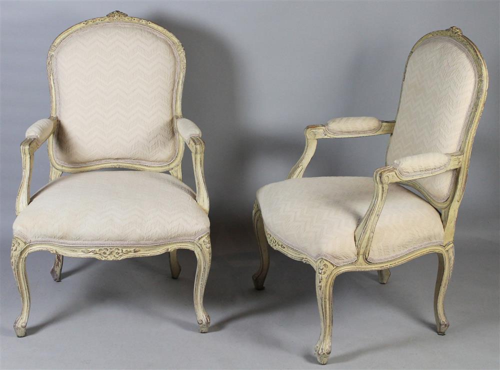 Appraisal: PAIR OF LOUIS XV STYLE CARVED CREAM PAINTED OPEN ARM