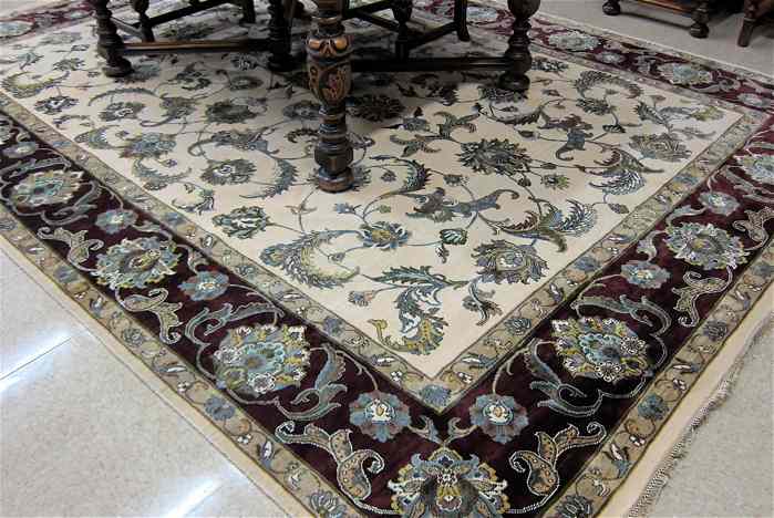 Appraisal: HAND KNOTTED ORIENTAL CARPET Persian Isfahan design of floral tracery