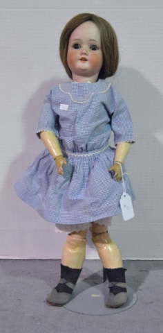 Appraisal: German Girl Doll By Schoenau Hoffmeister Brown set eyes open