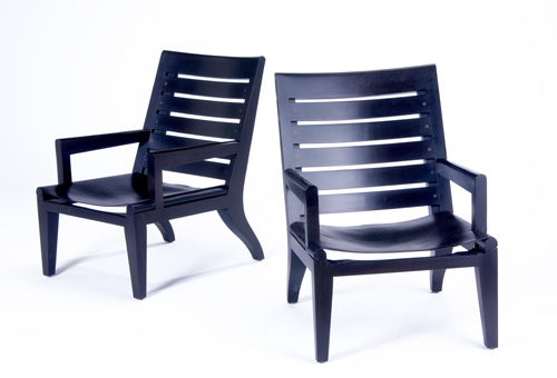 Appraisal: CHRISTIAN LIAGRE HOLLY HUNT Pair of lounge chairs in ebonized