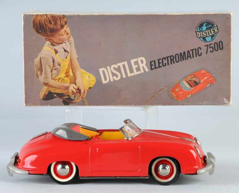 Appraisal: Tin Distler Porsche Automobile Wind-Up Toy Description German Circa s