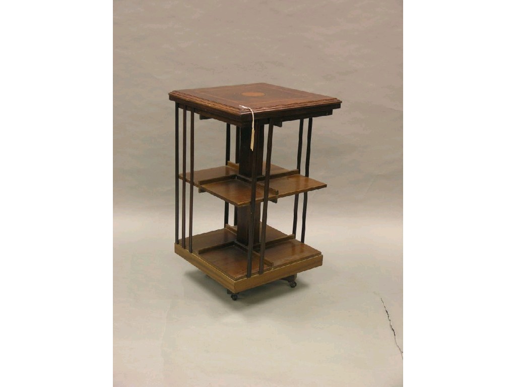 Appraisal: A reproduction inlaid mahogany revolving bookcase two-tiered square shape on