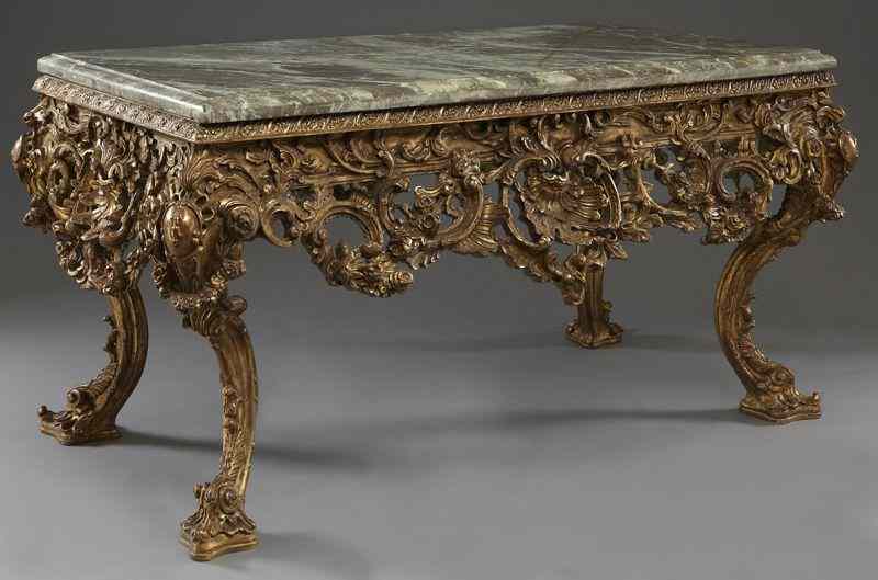 Appraisal: Georgian style gilt wood center tablewith rectangular marble top carved