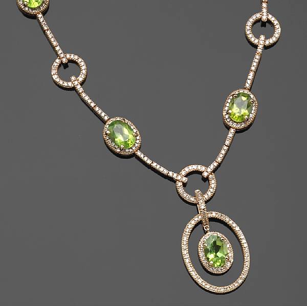 Appraisal: A peridot diamond and k gold necklace estimated total diamond