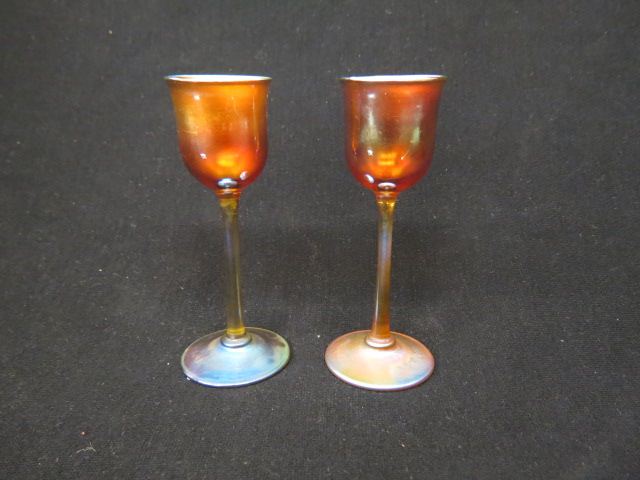 Appraisal: Pair of Tiffany Favrile Art Glass Cordials rich golden iridescent