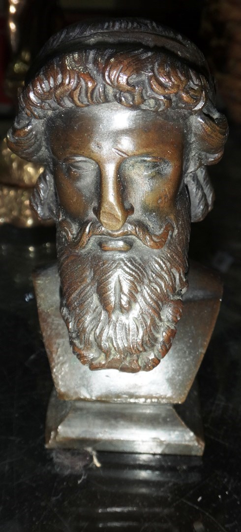 Appraisal: A small bronze bust of a bearded man