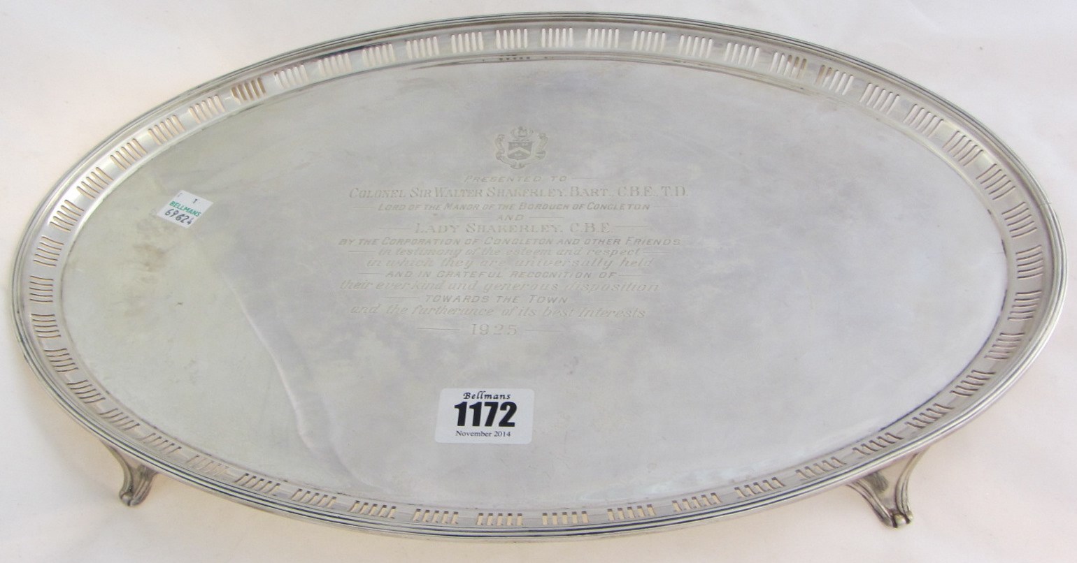 Appraisal: A silver oval salver presentation inscribed to the centre within