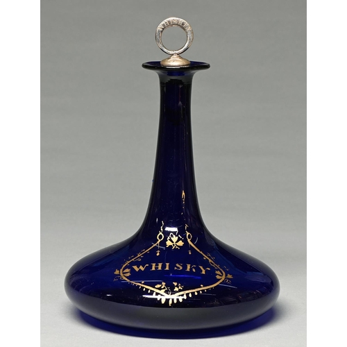 Appraisal: An English cobalt glass mell decanter c with shaped gilt