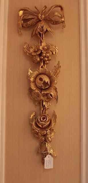 Appraisal: A PAIR OF GEORGIAN STYLE CARVED GILT RIBBON TIED FLOWER