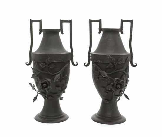 Appraisal: A Pair of Cast Metal Urns of handled baluster form