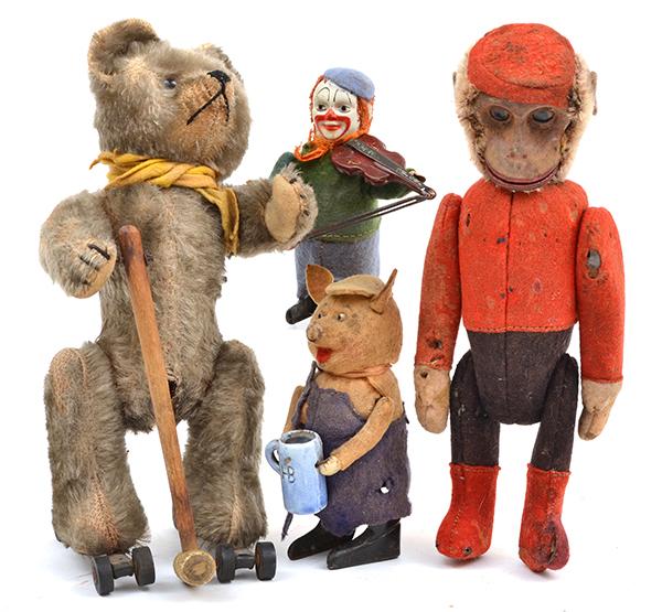 Appraisal: THREE CLOCKWORK SCHUCO TOYS INCLUDING ROLLY BEAR PIG HOLDING A