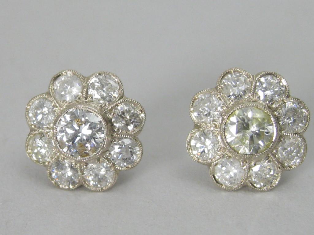 Appraisal: A pair of Diamond Ear Studs the collet-set circular-cut larger