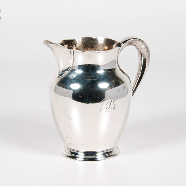 Appraisal: American ca s A sterling silver pitcher having a scalloped