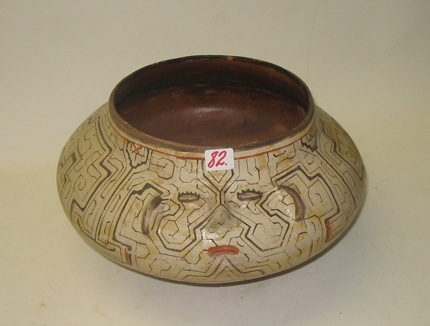 Appraisal: A CENTRAL AMERICAN INDIAN POT hand painted with raised senses