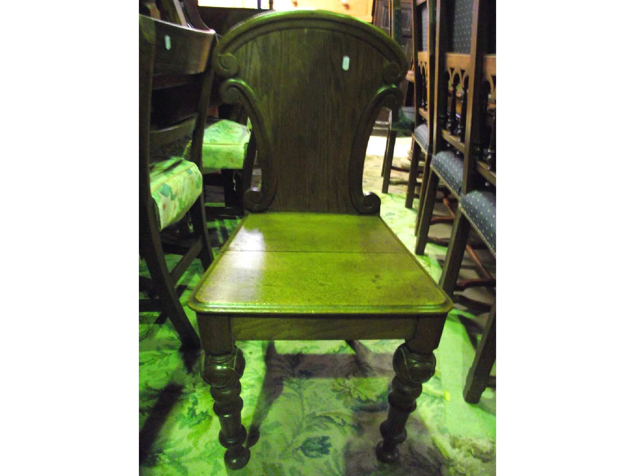 Appraisal: A pair of Georgian mahogany bar back dining chairs with