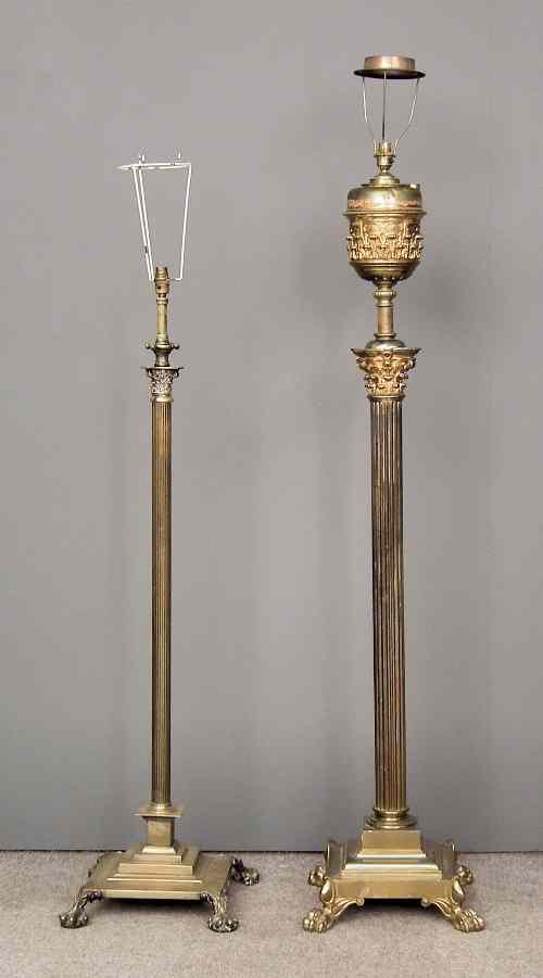 Appraisal: A brass electric standard lamp with fluted column and bold